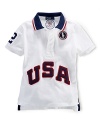 This breathable cotton mesh polo celebrates Team USA's participation in the 2012 Olympics with bold graphics and embroidery.