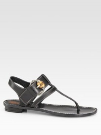 Leather slingback with buckle hardware, intricate stitching and a thong front. Leather upperLeather lining and soleMade in ItalyOUR FIT MODEL RECOMMENDS ordering one half size down as this style runs large. 