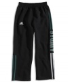 These elastic waistband action pants by adidas have lots of room for him to show off his sporting prowess.