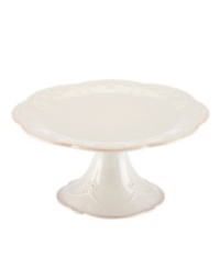 With fanciful beading and a feminine shape, this cake stand from the Lenox French Perle white dinnerware collection has an irresistibly old-fashioned sensibility. Hard-wearing stoneware is dishwasher safe and, in a soft white hue with antiqued trim, a graceful addition to dessert.