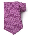 Repeating Gancini logos signify your taste for quality and luxury on this handsome tie from Salvatore Ferragamo.