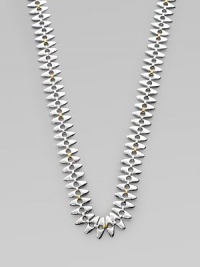 A unique design with tribal appeal in sleek sterling silver and radiant 24k gold. Sterling silver24k goldLength, about 39½ Lobster clasp closureImported 