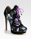 A floral print and bright laces freshen this on-trend ankle boot in canvas with lush suede accents. Suede-covered heel, 5¼ (130mm)Suede-covered island platform, ¾ (20mm)Compares to a 4½ heel (115mm)Canvas and suede upperLeather lining and solePadded insoleMade in Italy