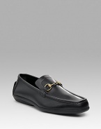 Driving loafer with signature brass horse bit. Also available in black with brass horse bit. Rubber sole Made in Italy 