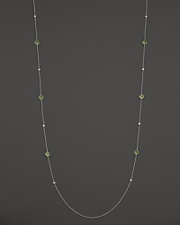 Bezel set diamonds and peridot stones in a sterling silver chain. From Ippolita.