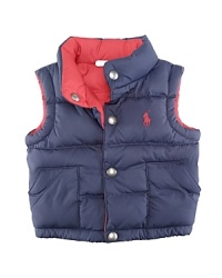 The Reversible Elmwood Puffer Vest is crafted from channel-stitched microfiber for versatility and lightweight warmth.