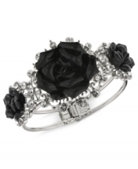 Black and beautiful. This bangle bracelet from 2028, crafted from silver-tone mixed metal, features glass stones and jet-colored flower details for a stunning effect. Approximate diameter: 6-1/2 inches.