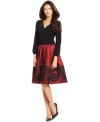 SL Fashions adds a flirty touch to this party dress by adding split sleeves that show off the shoulders.