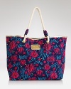 Perfectly Lilly Pulitzer, this tote is the perfect warm-weather carryall. Pair the print with coordinating flip flops and swimwear or tote the preppy stunner solo.