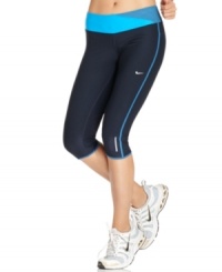 Sleek and stretchy, these Nike capris are designed for easy movement in a moisture-wicking fabric with Dri-FIT technology. Chic color-blocking and bright piping keeps you looking stylish even during the toughest workout.