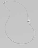 A wispy chain of 14k white gold features a cross pendant set askew for a modern edge.14k white gold Length, about 16 Pendant length, about ¾ Spring ring clasp Made in USA