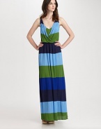 Bold, colorful stripes band this easy-to-wear floor-length silhouette.V necklineDraped surplice overlayGathered skirtFront slitAbout 42 from natural waistRayonDry cleanImportedModel shown is 5'10 (177cm) wearing US size Small. 