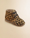 This stylish boot exudes easy polish with a heritage-inspired silhouette rendered in fun leopard-printed haircalf.Lace-upHaircalf upperLeather liningRubber soleImported