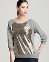 Jazz up your jeans with this sparkly sequin-embellished and soft PJK Patterson J. Kincaid top.