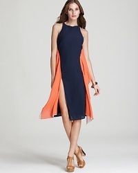 This BCBGMAXAZRIA dress, boasting thigh-high slits, proves that the color-block trend is as elegant as it is striking.