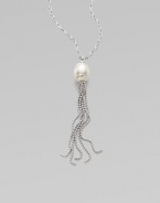 A baroque pearl with a sterling silver tassel on a sterling silver chain. 16mm baroque white organic man-made pearl Length, about 36 Sterling silver Lobster clasp closure Imported 