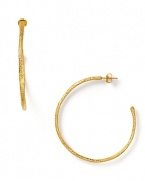 Alexis Bittar's simple textured hoops are the perfect accent to your look, day or night.