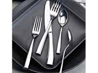 Silhouette Flatware by Couzon. The rich and lovely design of Couzon's Silhouette flatware captures the sophistication and grace that is the essence of French style. Highly polished. Extra heavy weight, full European size.