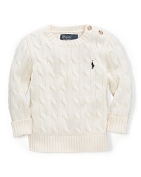 A classic cable crewneck sweater will keep your little one warm with its soft cotton.