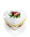 From the heart. A few winds of this Royal Albert musical jewelry box fills your home with the beloved melody, If You Love Me. Inspired by an English country garden, this charming keepsake is graced with a delicate floral motif and stows tiny treasures near and dear. Hinged, with gold banding.