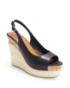 THE LOOKPeep toeAdjustable slingback strapPadded insoleCork and espadrille wedge, 4½ (115mm)Cork and espadrille platform, 1½ (40mm)Compares to a 3 heel(75mm)THE MATERIALLeather upperLeather liningRubber soleORIGINImported