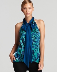 In a cool palette and goes-everywhere print, Elie Tahari's versatile Chesney blouse ties at the neck for a feminine finish.