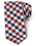 A nostalgic multi-tone check pattern features a narrower width for a modern silhouette and is crafted in plush silk.