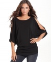 A sexy cut-out design makes the cold shoulder top very hot, by Rachel Rachel Roy.