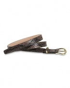 Make a like a glamour girl and cinch your waist with Cole Haan's skinny snake-embossed belt. Dressed up or down, this accessory tips the scales on sleek chic.