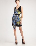 A graphic floral print in a two-tone color combination with pleated and draped front panel.V-neck Wrap front Pleated, draped front panel Banded waist and hem Gathered rear yoke About 20 from natural waist Silk; dry clean Imported Additional Information Women's Premier Designer & Contemporary Size Guide 