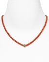 Subtly nod to this season's most in-demand colors with this beaded necklace from Michael Kors. It's simple design makes this a versatile take on vibrant style.