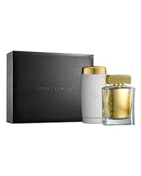 The David Yurman Elegant Expressions Collection features the 1.7 fl. oz. Eau de Parfum in a stunning, faceted golden jewel captured in a hand-polished crystal bottle, and crowned with a sculpted gold cap inspired by the iconic cable design. Also included is the perfect complement to the spray, the 6.8 oz. net wt. Luxurious Body Lotion. Packaged in a translucent, elongated bottle with a gold, flip top cap, accented with the David Yurman signature cable motif, the Luxurious Body Lotion envelops your skin in a sumptuous veil of softness. The collection is featured in a re-usable black, faux-lizard textured signature gift box with the David Yurman logo debossed on the cover. This set includes a 1.7 fl. oz. Eau de Parfum Spray, and a 6.8 oz. net wt. Luxurious Body Lotion.