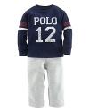 A sporty set pairs an essential fleece pant and an athletic cotton jersey tee with a faded graphic print.