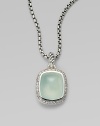 From the Noblesse Collection. A beautiful center stone of aqua chalcedony surrounded by a row of brilliant diamonds on a sterling silver box link chain. Aqua chalcedonyDiamonds, .3 tcwSterling silverLength, about 17Pendant size, about ½Lobster clasp closureImported 