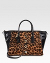 A fierce leopard print transforms this structured silhouette in soft calf hair mixed with rich leather accents. Detachable leather shoulder strap, 18½ dropDouble leather top handles, 5½ dropTop zip closureOne inside zip pocketTwo inside open pocketsCotton lining14W X 11H X 6DImported