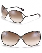 Add a modern element to your beach ensemble with Tom Ford's crossover metal sunglasses.