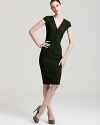 Cut a sharp silhouette in a Rachel Roy sheath dress accentuated with corded trim. Elevate the look with chic pumps and command the corner office.