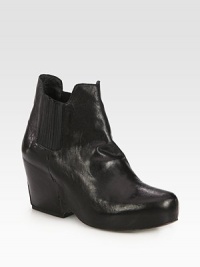 A powerful platform wedge heightens this street-ready leather silhouette, with comfortable side elastic panels. Self-covered wedge, 3½ (90mm)Hidden platform, 1¼ (30mm)Compares to a 2¼ heel (60mm)Leather upper with side elastic panelsPull-on styleLeather lining and solePadded insoleImported