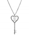 GUESS has the key to your heart with this pendant necklace. Crafted from silver-tone mixed metal with glistening glass crystal stones for a lustrous touch. Approximate length: 28 inches + 2-inch extender. Approximate drop: 3 inches.