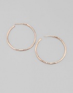 Slender hammered hoops of sterling silver and 18k gold, finished in the warm glow of 18k rose goldplating. An alloy of 18K gold and sterling silver plated with 18K rose gold Diameter, about 1¾ Post back Imported