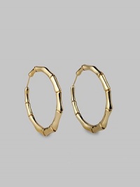 Bold bamboo-textured hoops, exquisitely crafted of gleaming 18k yellow gold. 18k yellow gold Diameter, about 2¼ Pierced Made in Italy