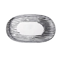 Organically molded under fire, this handmade platter exudes metal artistry with a New York edge.