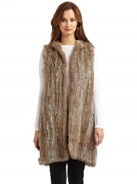 THE LOOKOpen front necklineFur hoodSleevelessTHE FITAbout 34 from shoulder to hemTHE MATERIALGenuine rabbit furCARE & ORIGINDry clean by fur specialistImportedFur origin: China