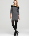 Every woman needs a classic go-to sweater dress for her fall wardrobe. We suggest this color block day player.