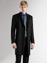 A classic wool topcoat features a double-breasted front and signature GG lining. Double-breasted buttonfront Three waist flap pockets Signatur elining About 34½ from shoulder to hem Wool Dry clean Made in Italy 