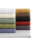 A riveting spectrum of color, the Resort washcloth from Calvin Klein features fashionable hues set in luxurious Egyptian cotton. Attractive tufted stripes along the hem add subtle dimension. Coordinate with any bath accessories to create an invigorating bathroom retreat.