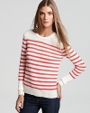 Slim, nautical stripes enrich this classic Theory sweater--a made made in perfect style with denim.