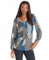 A mixed patchwork print with a touch of blue lends this Style&co. petite top a striking look.