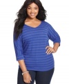 Show off your sparkle this season in Extra Touch's three-quarter-sleeve plus size top, featuring metallic stripes.