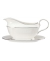 For nearly 150 years, Lenox has been renowned throughout the world as a premier designer and manufacturer of fine china. The simple and classic Hannah Platinum pattern brings a timeless refinement to your formal entertaining table, in pure white bone china embossed with a subtle palmetto-leaf design, and banded in platinum. Gravy boat shown back right.